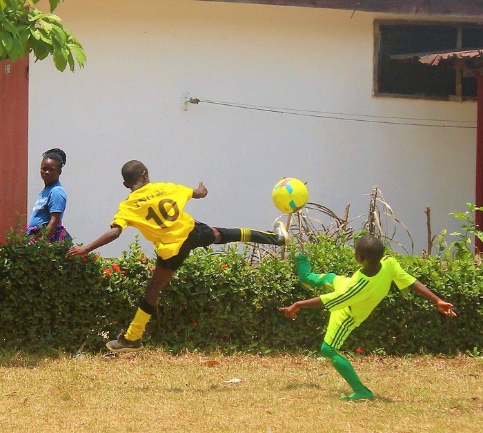 Children playing football