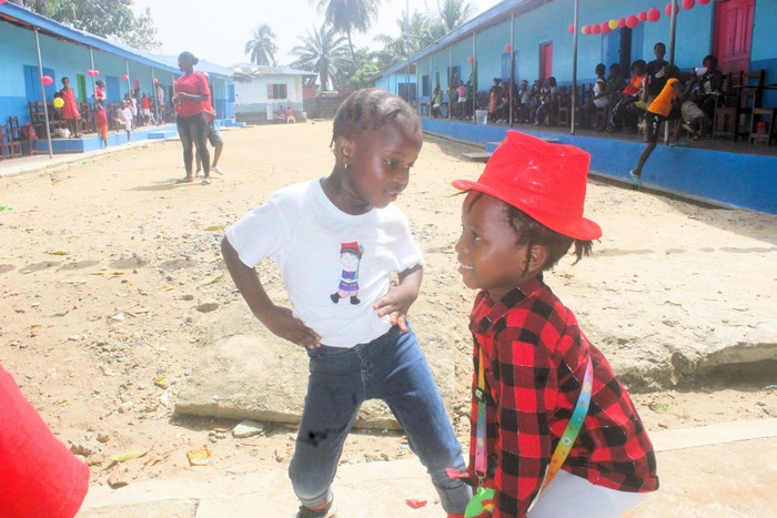 children and parents at Damiefa School